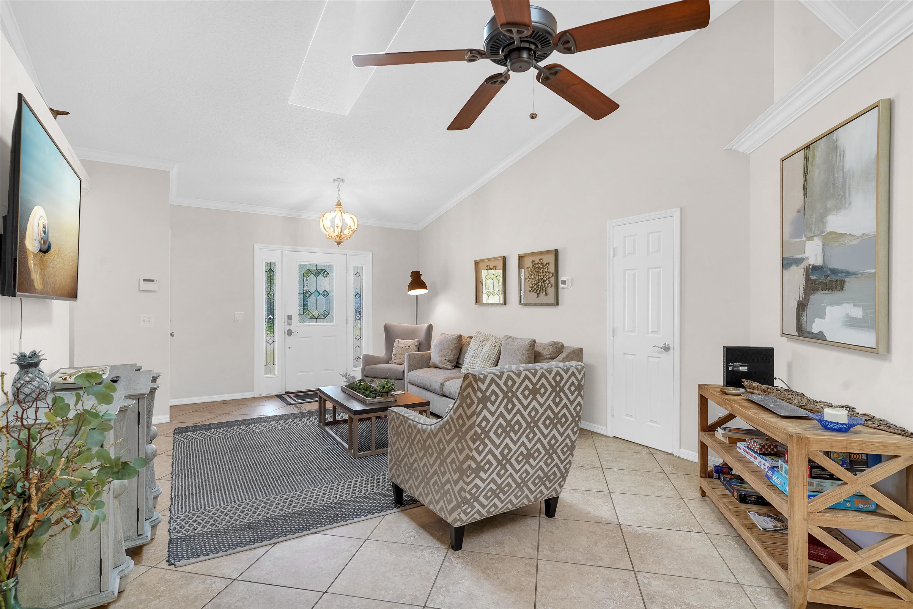 404 Fourteenth Street St. Augustine, FL 32084 - Photo 8 of 35 a living room with furniture and a flat screen tv