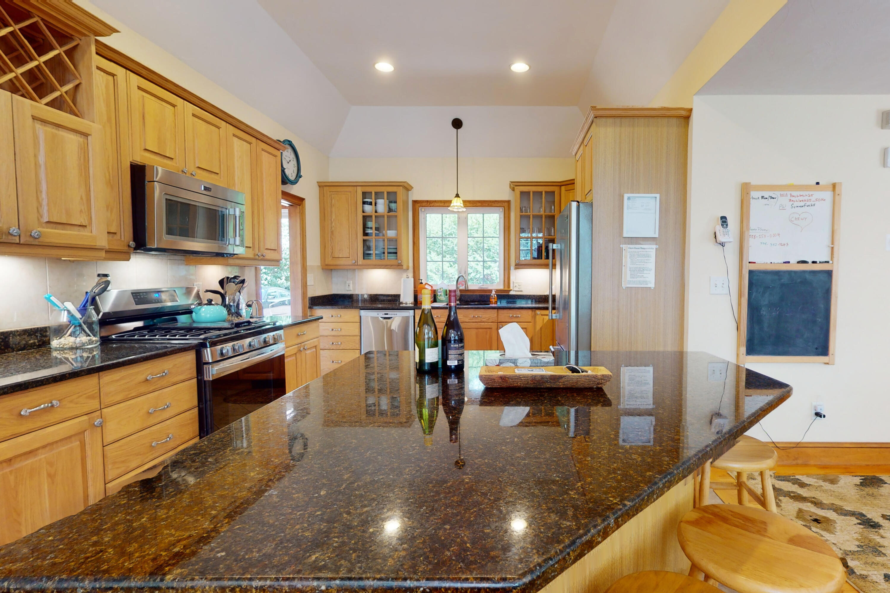 25 Fairmount Road South Dennis, MA 02660 - Photo 12 of 61 a kitchen with stainless steel appliances granite countertop a stove a sink and a refrigerator