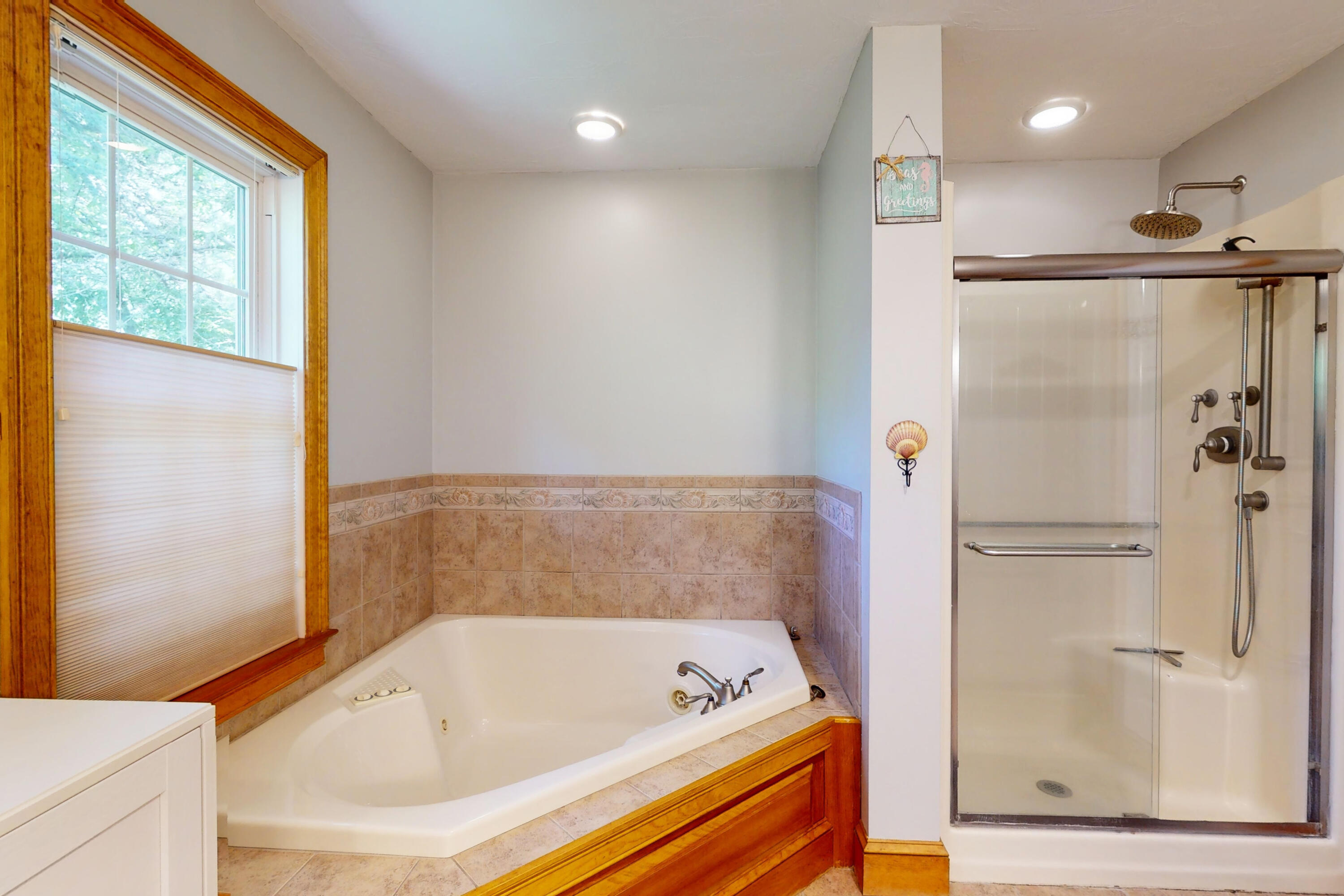 25 Fairmount Road South Dennis, MA 02660 - Photo 22 of 61 a bathroom with a tub a sink and a shower