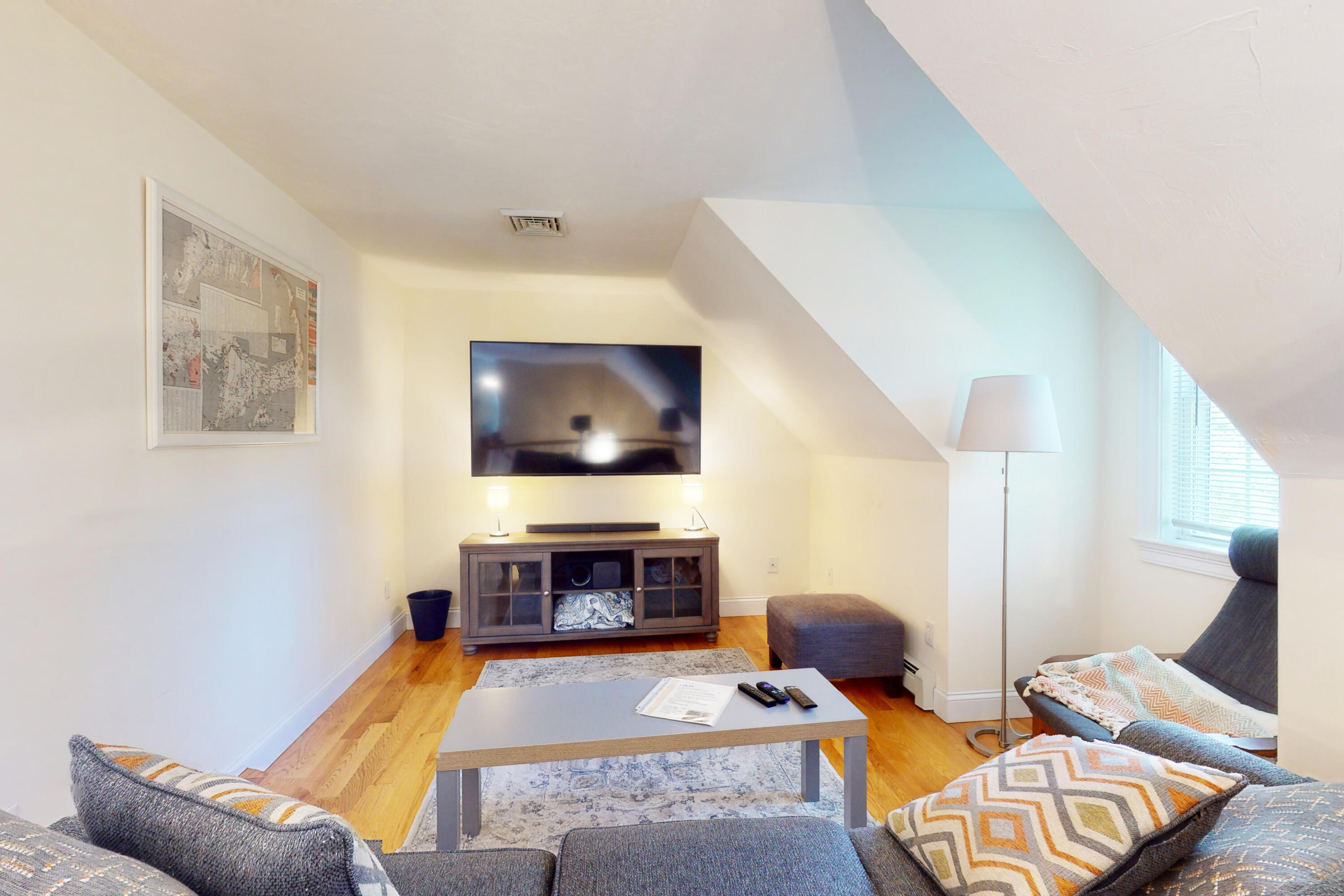 25 Fairmount Road South Dennis, MA 02660 - Photo 27 of 61 a living room with furniture and a fireplace