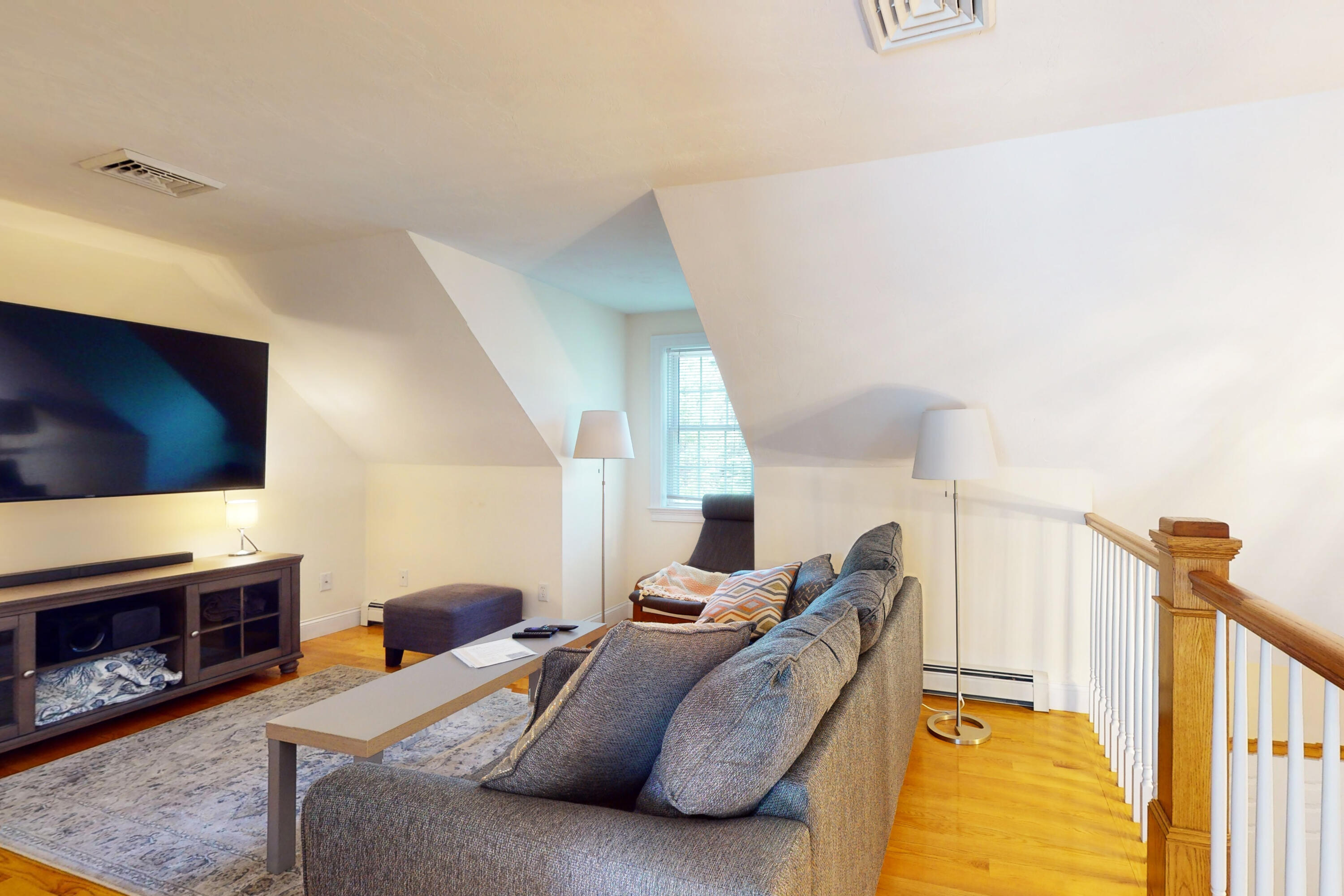 25 Fairmount Road South Dennis, MA 02660 - Photo 28 of 61 a living room with furniture a flat screen tv and a fireplace