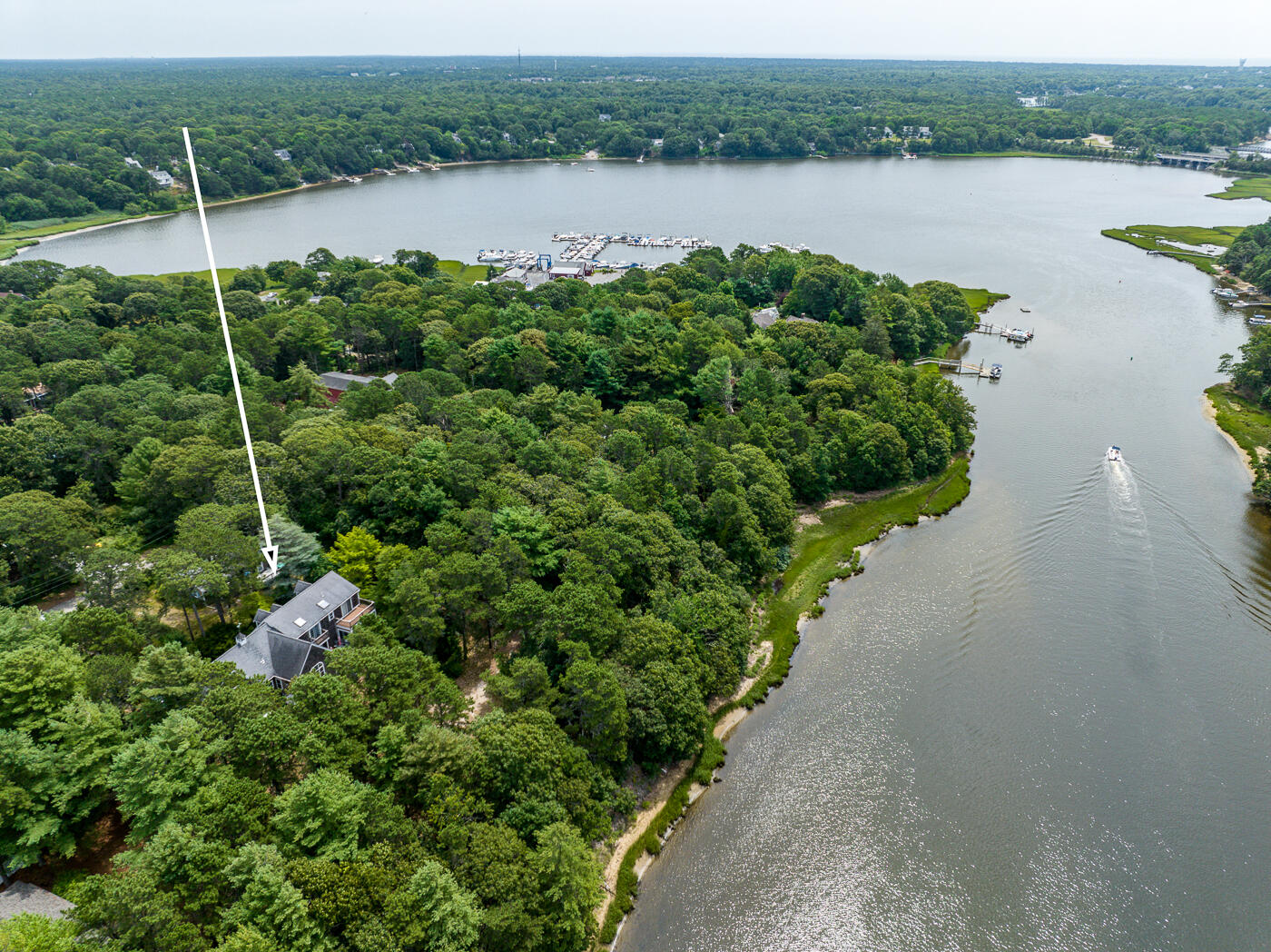 25 Fairmount Road South Dennis, MA 02660 - Photo 3 of 61 a view of a lake from a yard