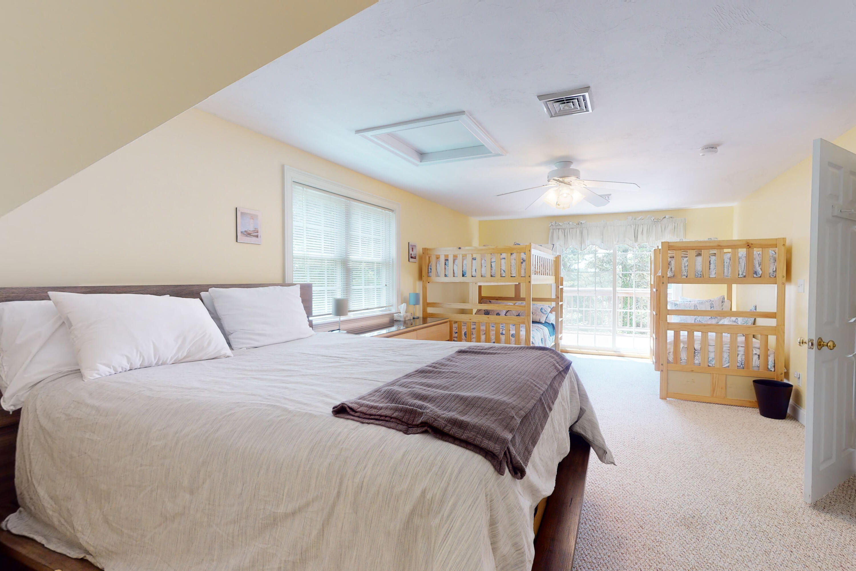 25 Fairmount Road South Dennis, MA 02660 - Photo 34 of 61 a bedroom with a large bed and a large window