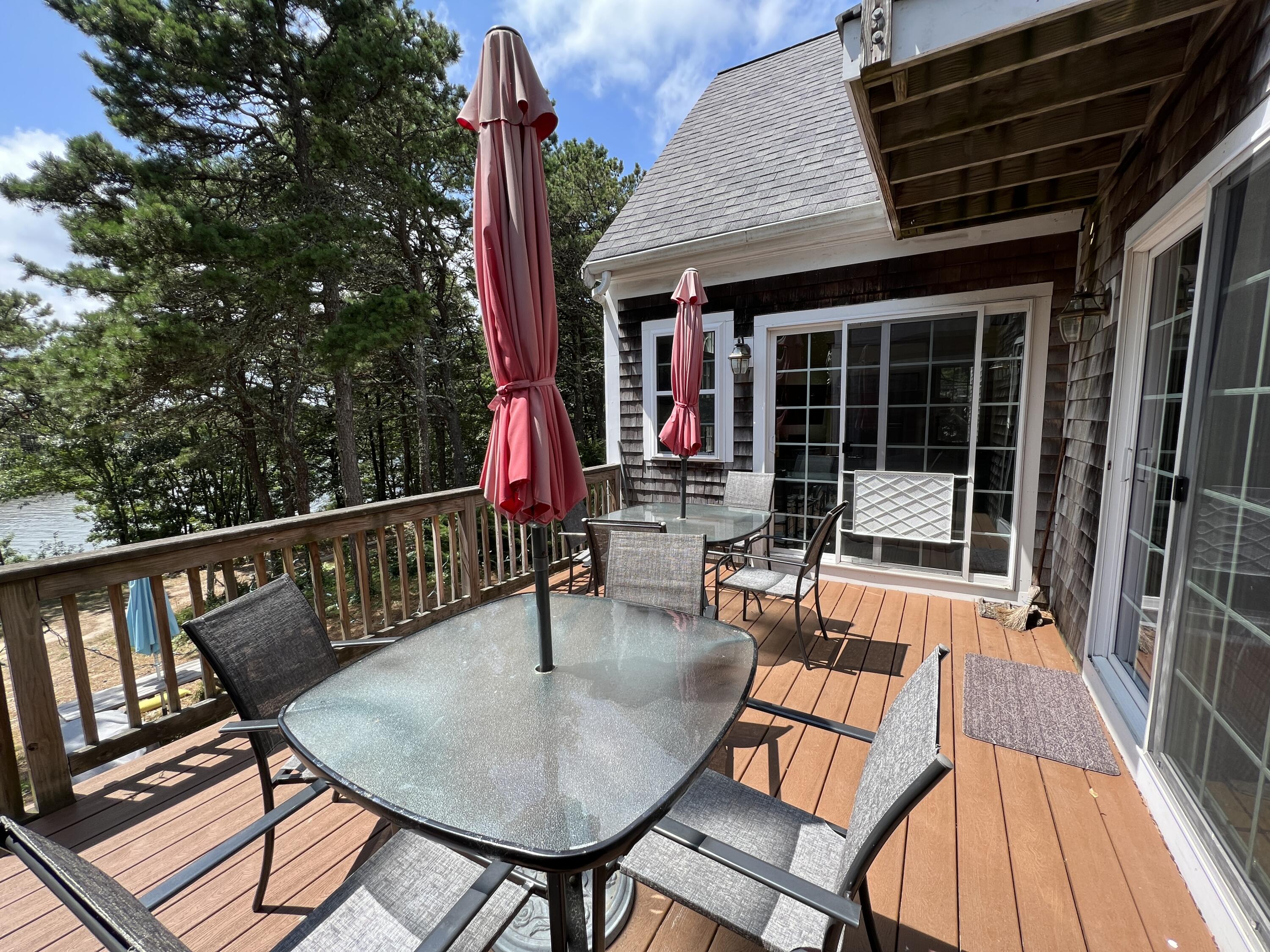 25 Fairmount Road South Dennis, MA 02660 - Photo 38 of 61 a balcony with table and chairs