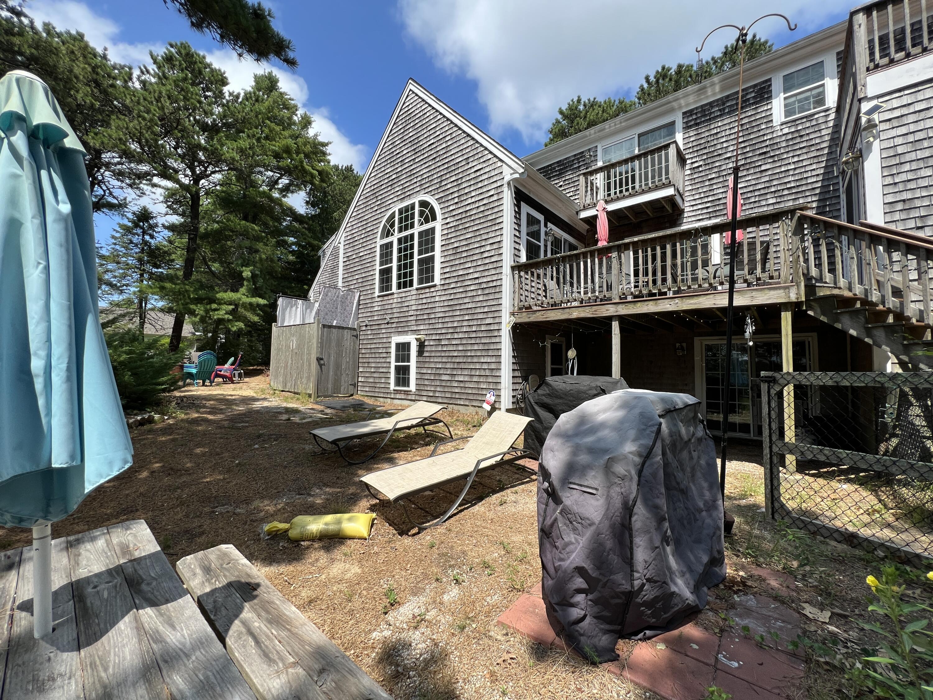 25 Fairmount Road South Dennis, MA 02660 - Photo 39 of 61 a front view of a house with a yard