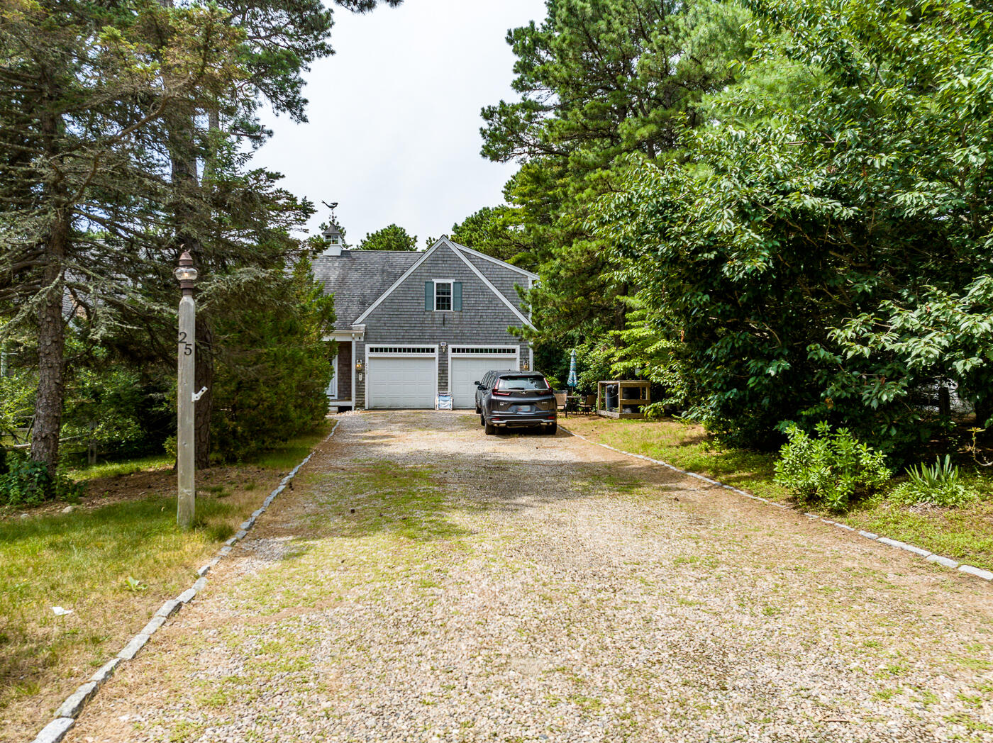 25 Fairmount Road South Dennis, MA 02660 - Photo 46 of 61 a view of a house with a yard