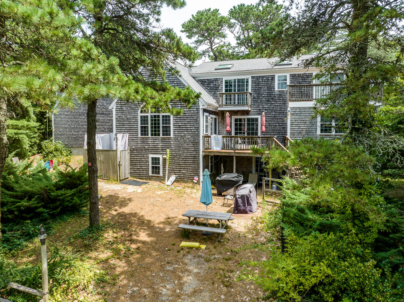 25 Fairmount Road South Dennis, MA 02660 - Photo 55 of 61 a view of a house with backyard porch and furniture