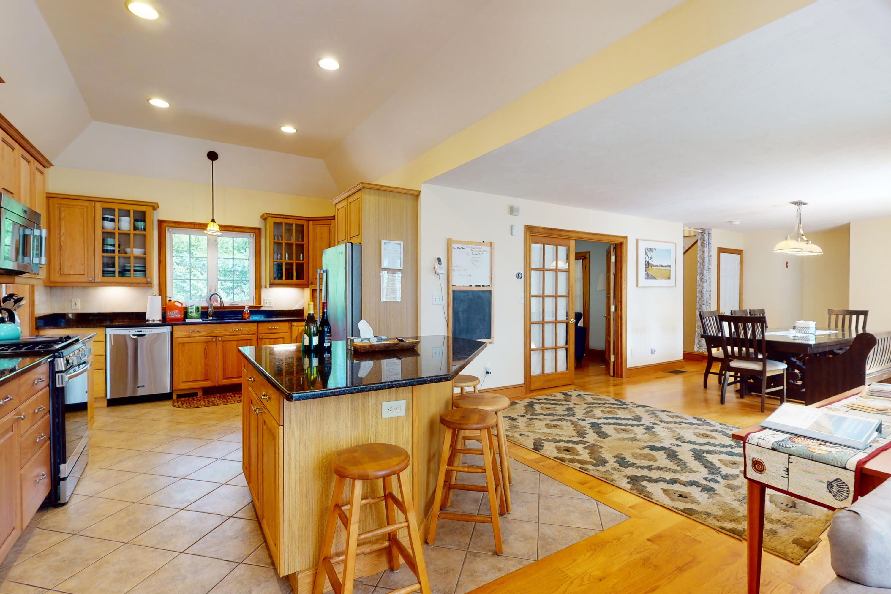 25 Fairmount Road South Dennis, MA 02660 - Photo 9 of 61 a living room with dining table furniture kitchen view and a large window