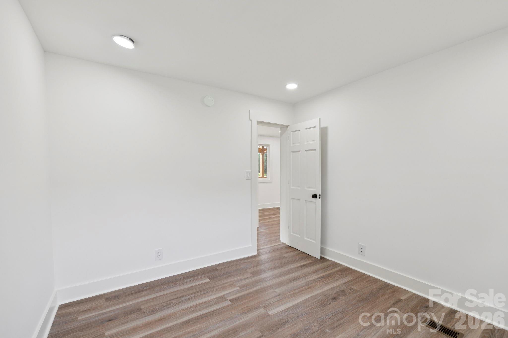 431 Pole Miller Extension Brevard, NC 28712 - Photo 13 of 24 a view of an empty room