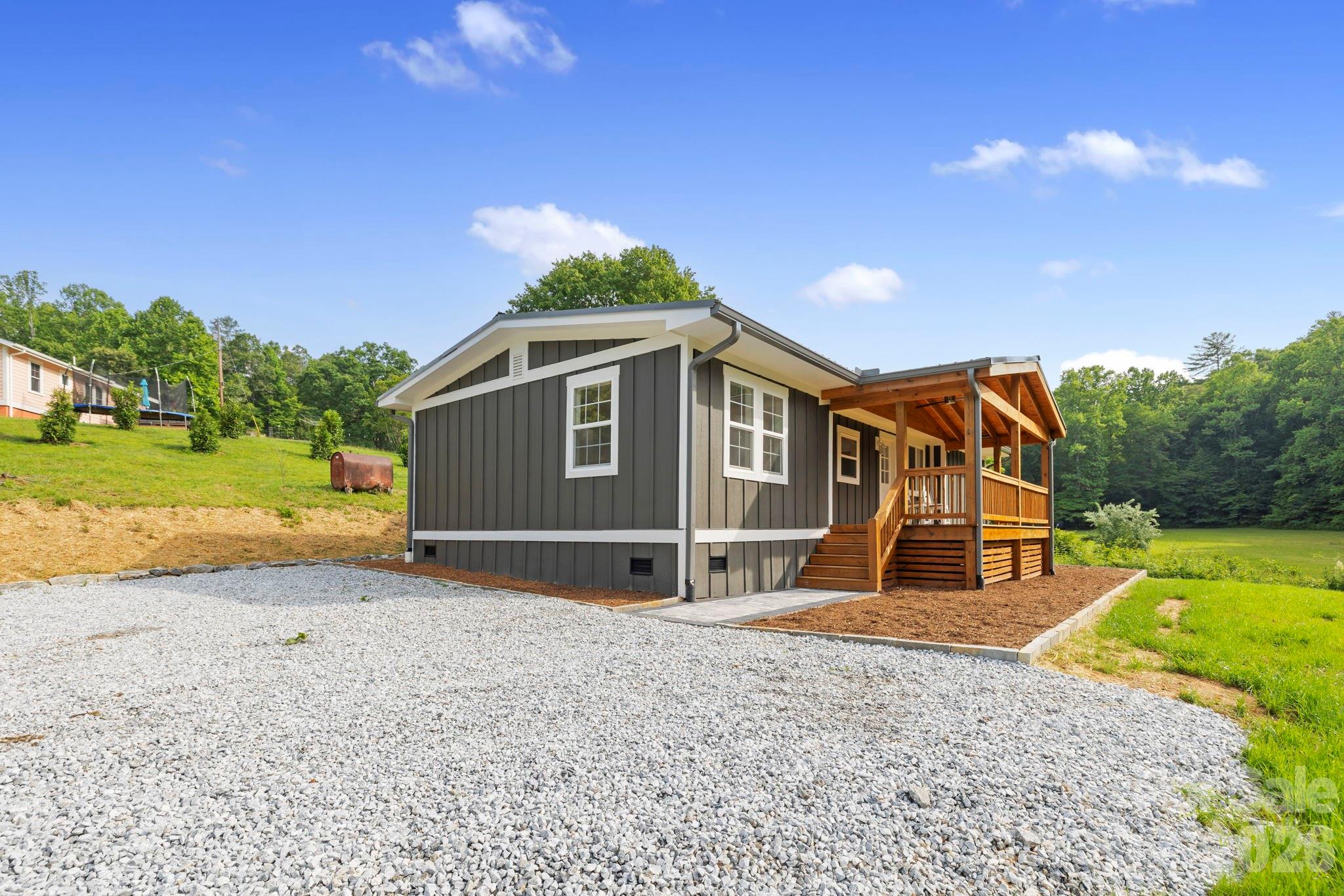 431 Pole Miller Extension Brevard, NC 28712 - Photo 21 of 24 a house with outdoor space