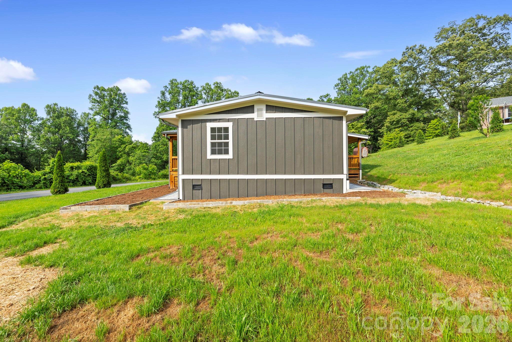 431 Pole Miller Extension Brevard, NC 28712 - Photo 23 of 24 a view of backyard with green space