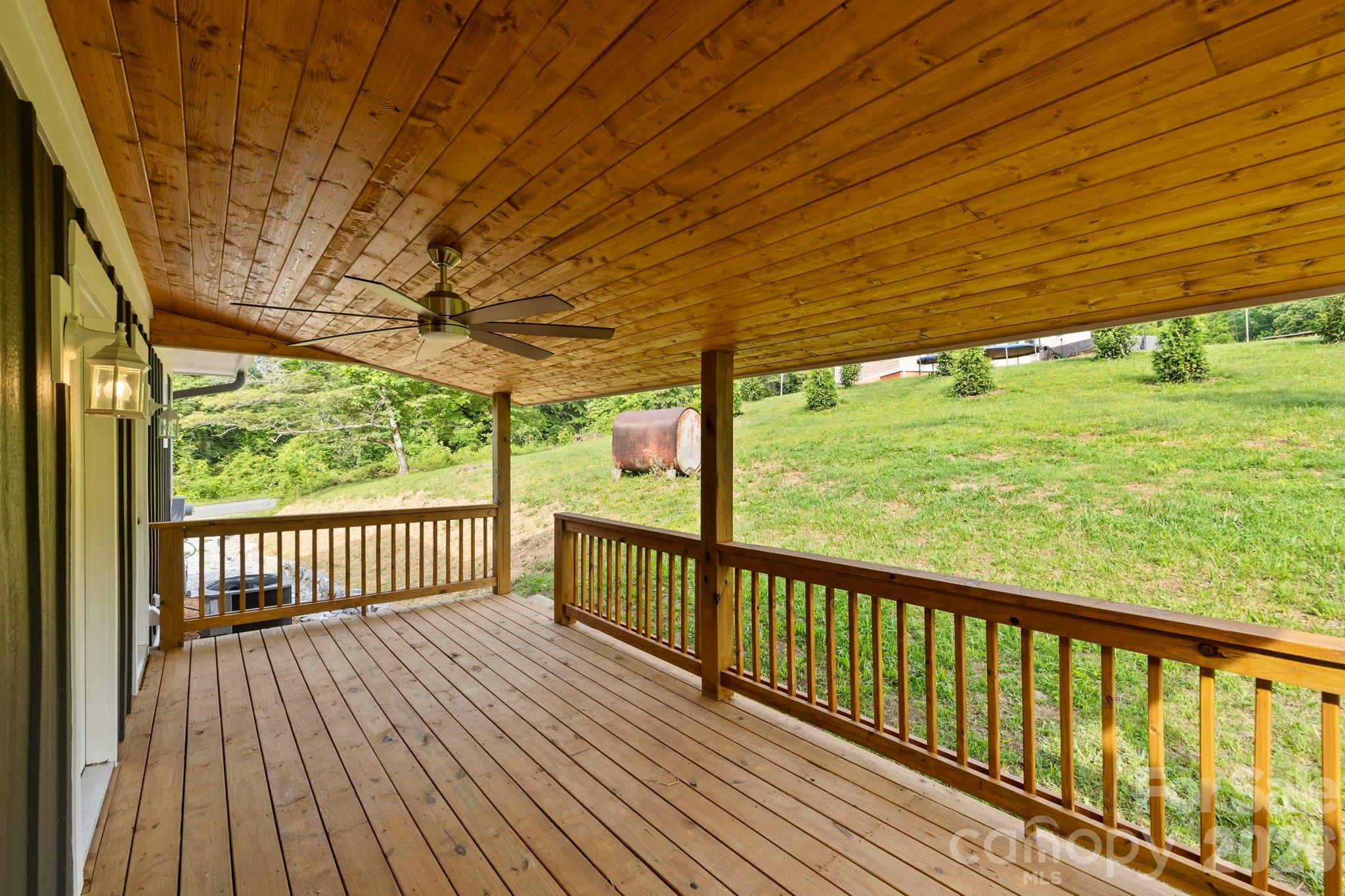 431 Pole Miller Extension Brevard, NC 28712 - Photo 3 of 24 a view of porch with a yard
