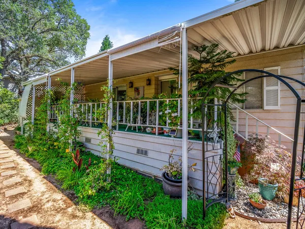 a house view with a garden space