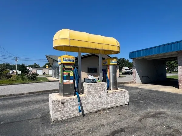 a view of a chairs and table in the patio