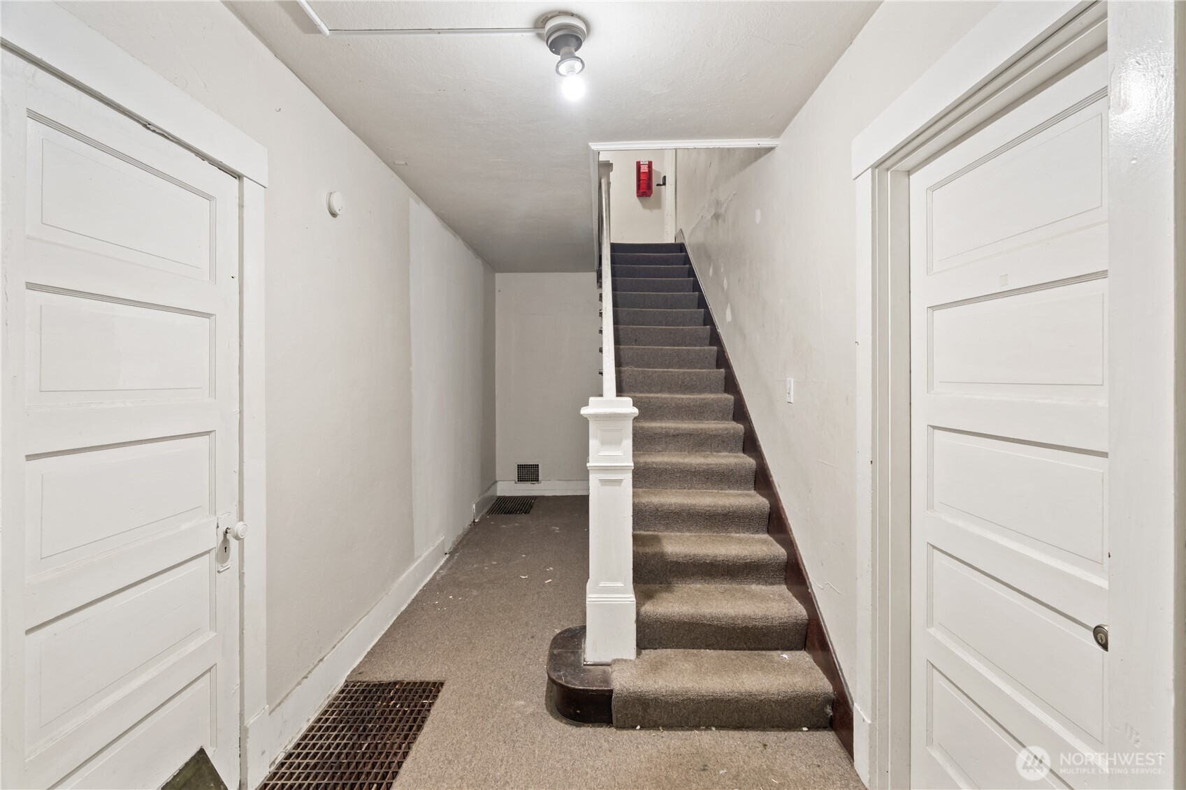 521 West 3rd Street Aberdeen, WA 98520 - Photo 2 of 13 a view of entryway and hall with wooden floor