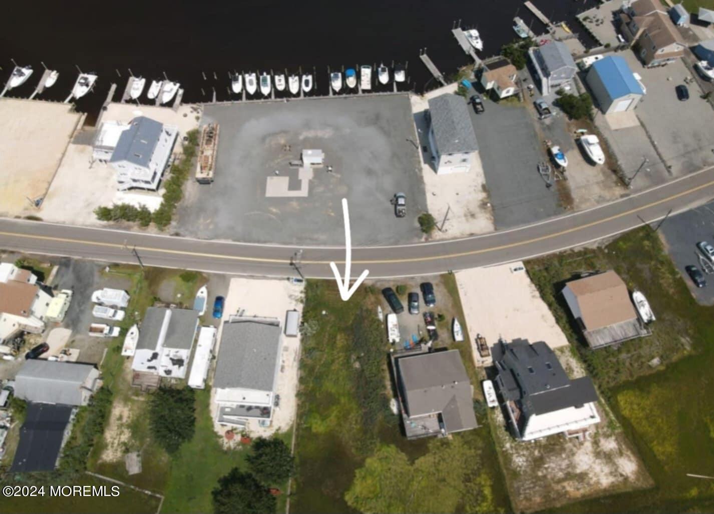 0 Dock Road West Creek, NJ 08092 - Photo 3 of 7 an aerial view of a house with pool patio and outdoor seating