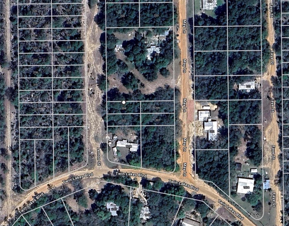 202 Lemon Street Interlachen, FL 32148 - Photo 3 of 4 a room with wine bottles