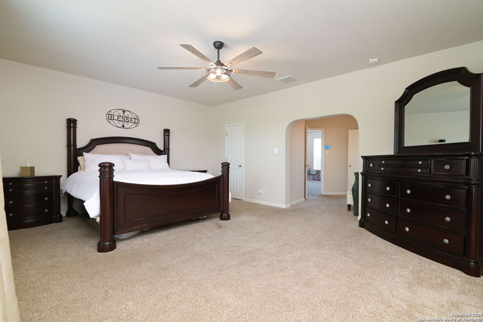 8918 Cordes Junction Helotes, TX 78023 - Photo 16 of 41 a living room with a bed and a dresser