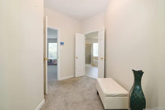 a bathroom with a toilet and a sink