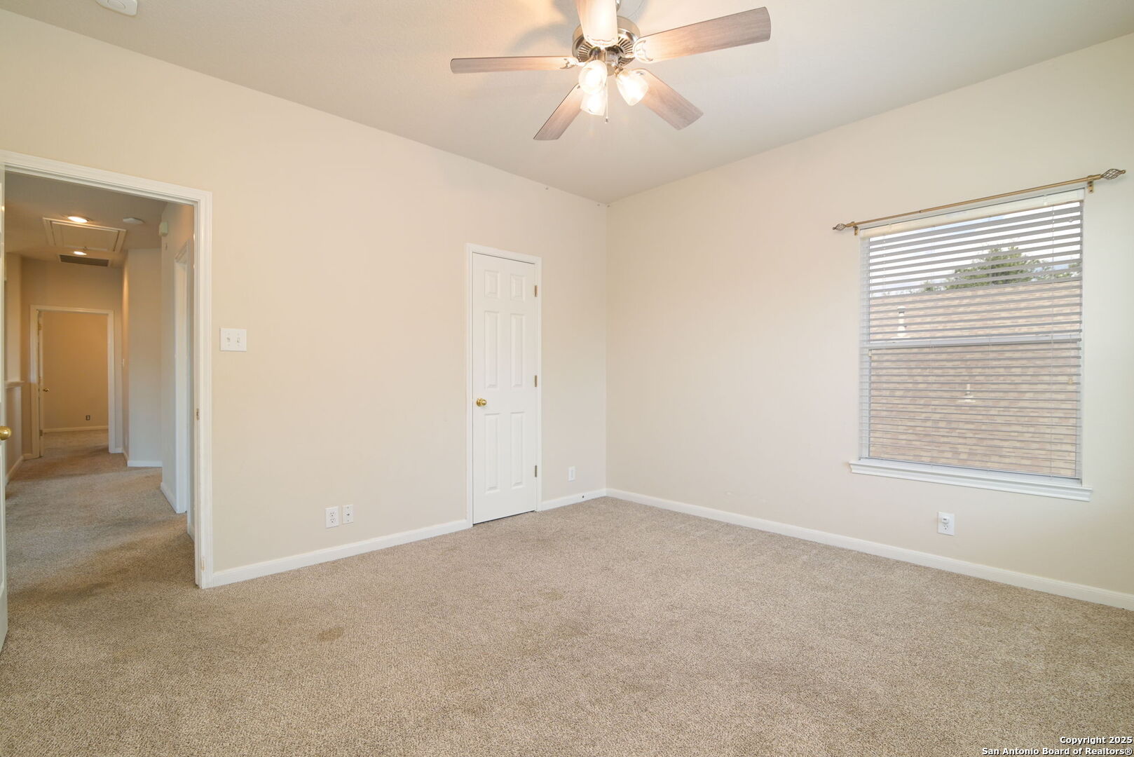 8918 Cordes Junction Helotes, TX 78023 - Photo 26 of 41 an empty room with a window and a fan