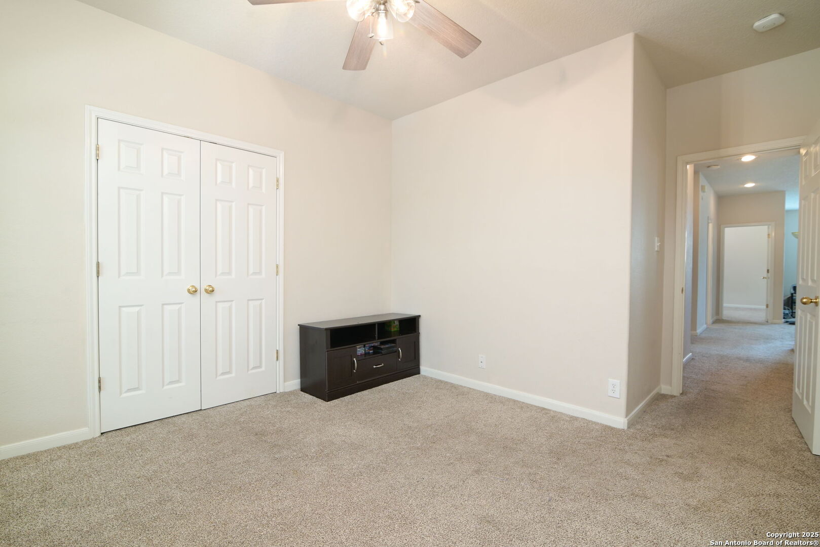 8918 Cordes Junction Helotes, TX 78023 - Photo 27 of 41 an empty room with a ceiling fan and a window