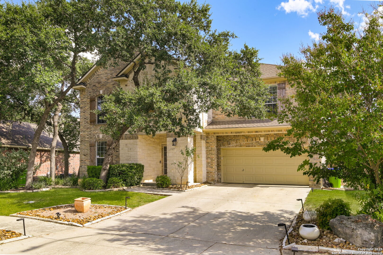 8918 Cordes Junction Helotes, TX 78023 - Photo 3 of 41 front view of a house with a yard