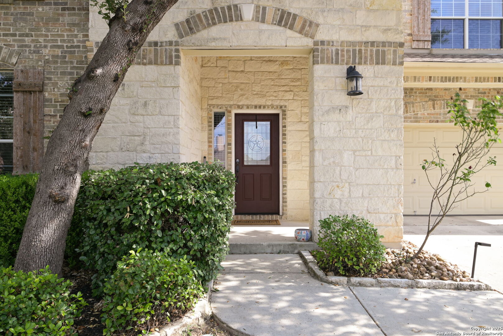 8918 Cordes Junction Helotes, TX 78023 - Photo 34 of 41 a front view of a house with garden