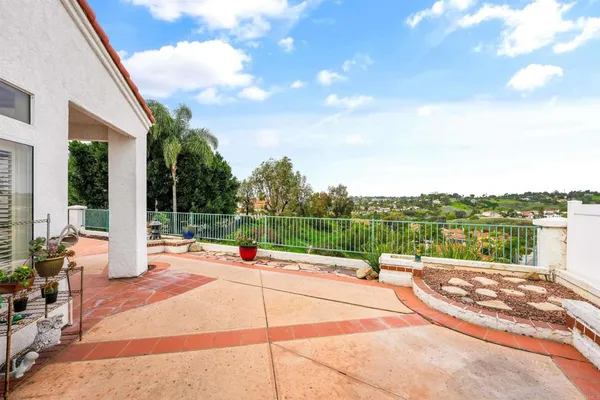 a view of a terrace with sitting area