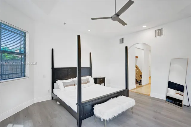 a view of an empty room and fire place