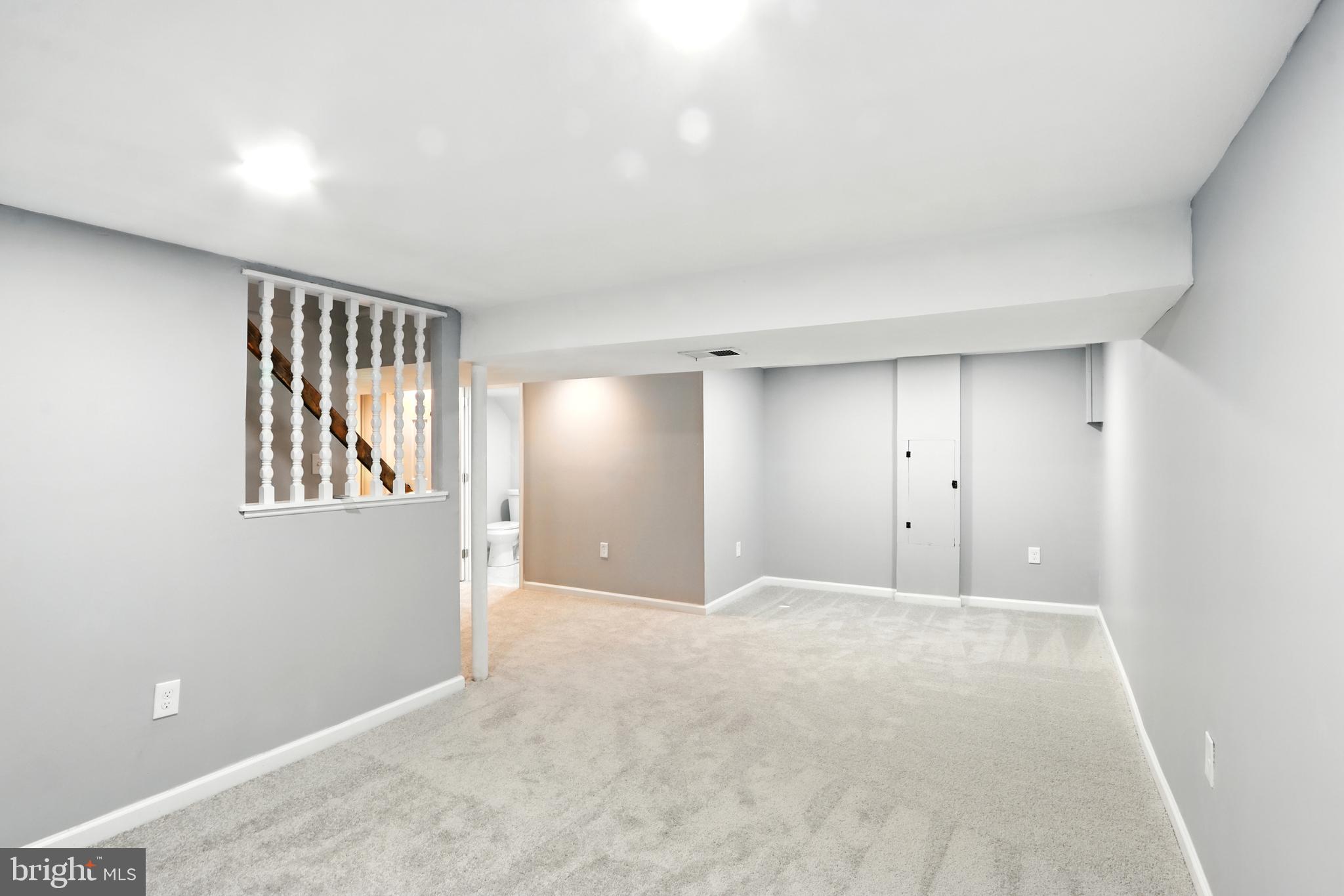 6603 Fairmount Avenue Baltimore, MD 21215 - Photo 11 of 19 a view of an empty room with a window