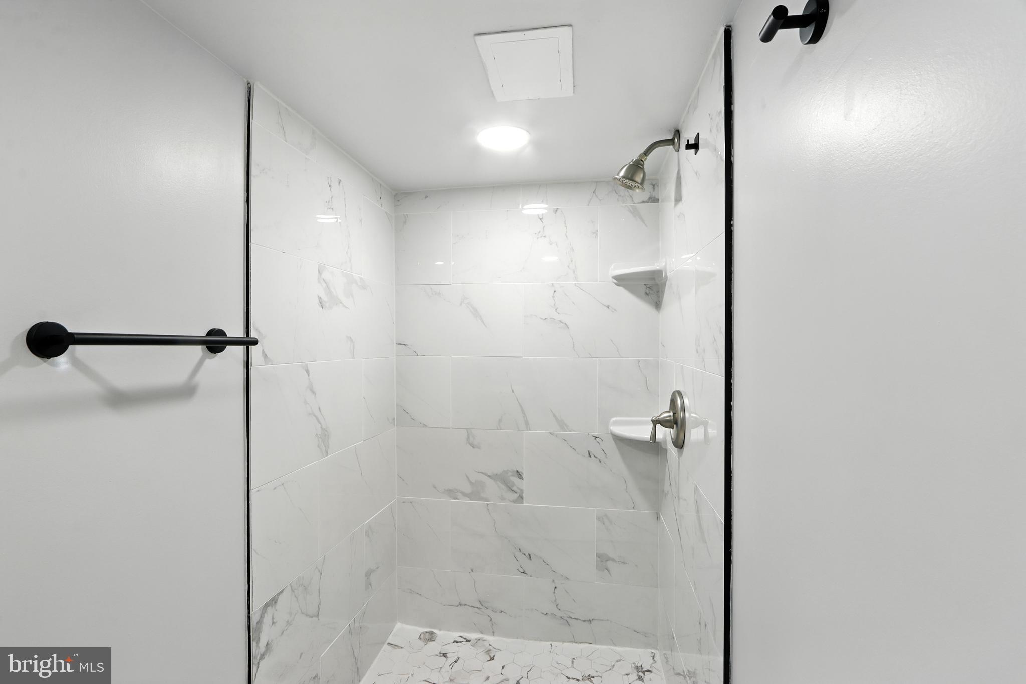 6603 Fairmount Avenue Baltimore, MD 21215 - Photo 13 of 19 a bathroom with a shower