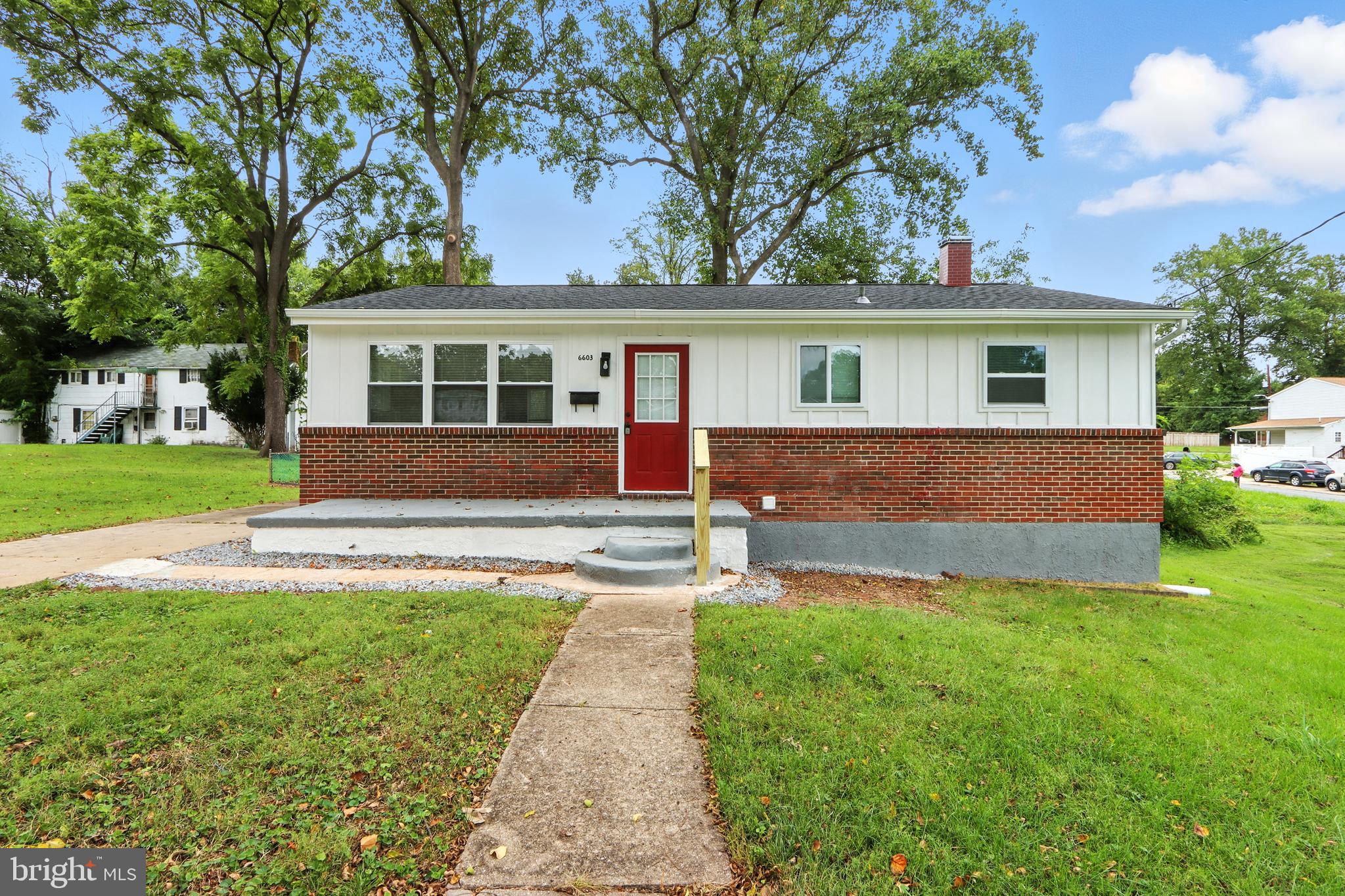 6603 Fairmount Avenue Baltimore, MD 21215 - Photo 17 of 19 a front view of house with yard and green space