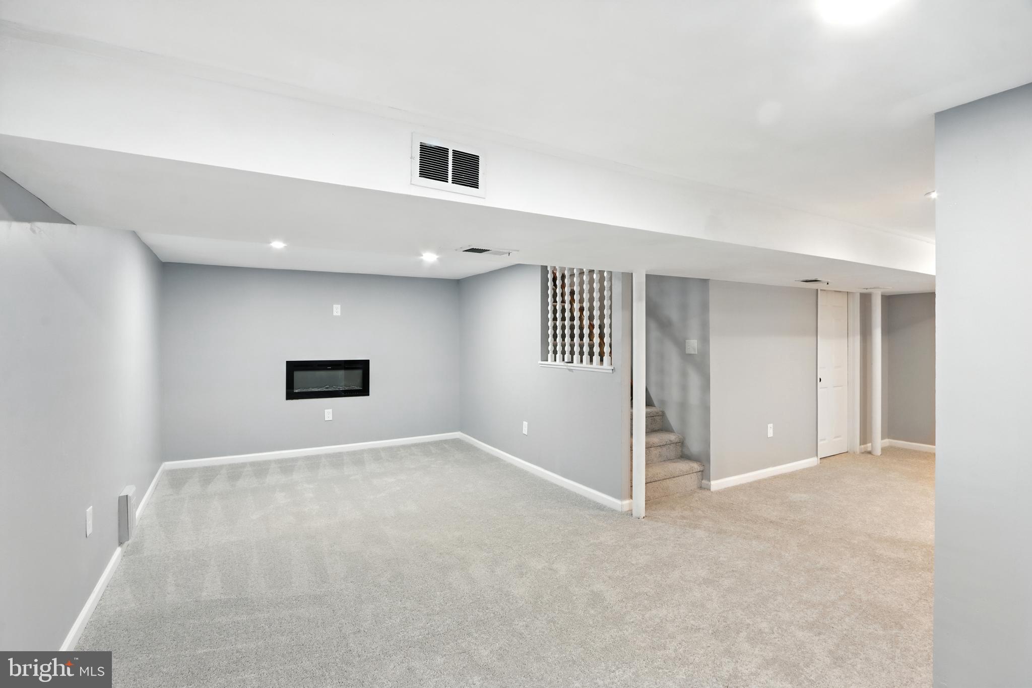 6603 Fairmount Avenue Baltimore, MD 21215 - Photo 10 of 19 a view of an empty room with a workspace