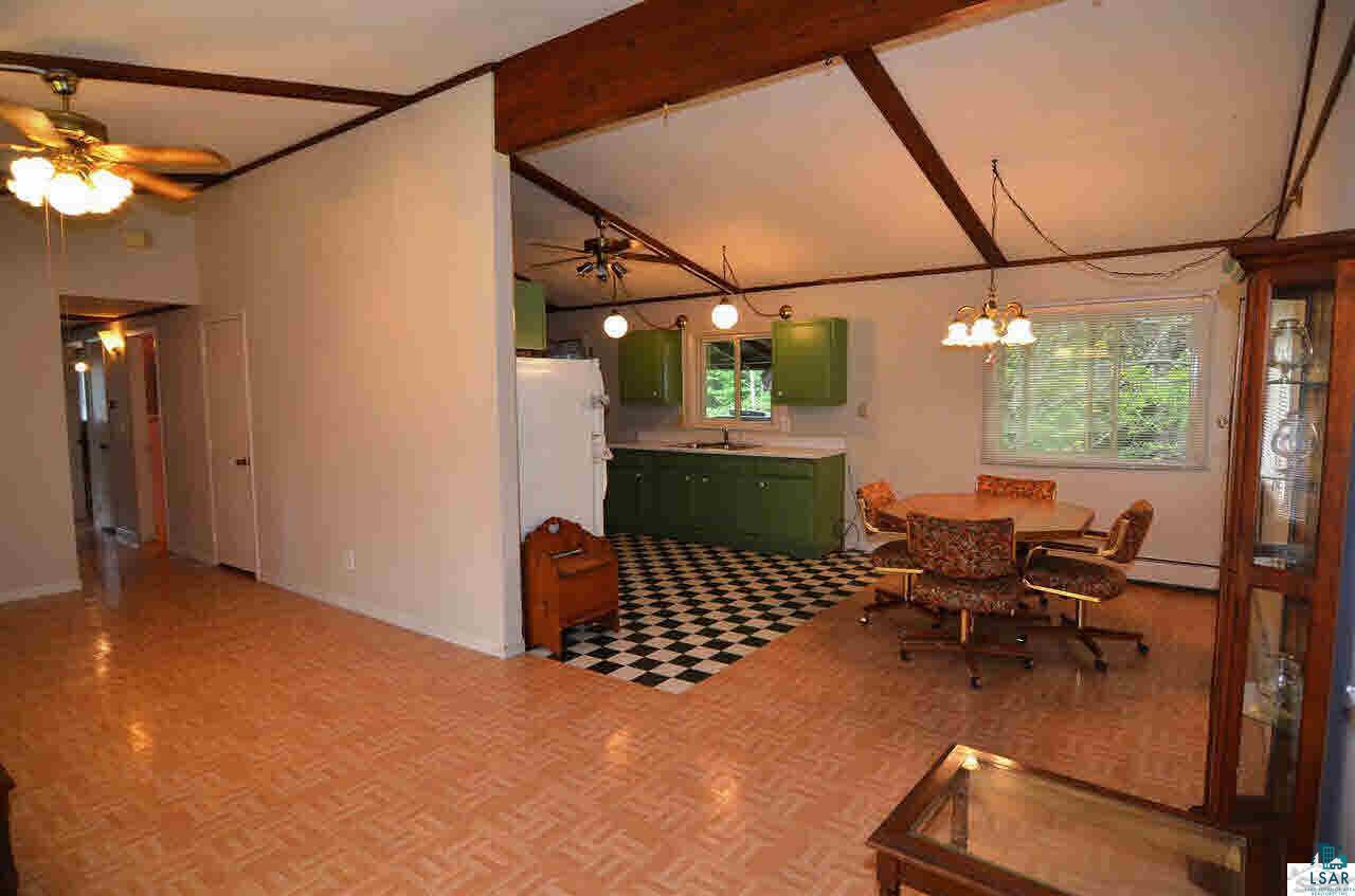 8722 South Karras Road Lake Nebagamon, WI 54849 - Photo 3 of 25 Livingroom-Kitchen-Dining Area