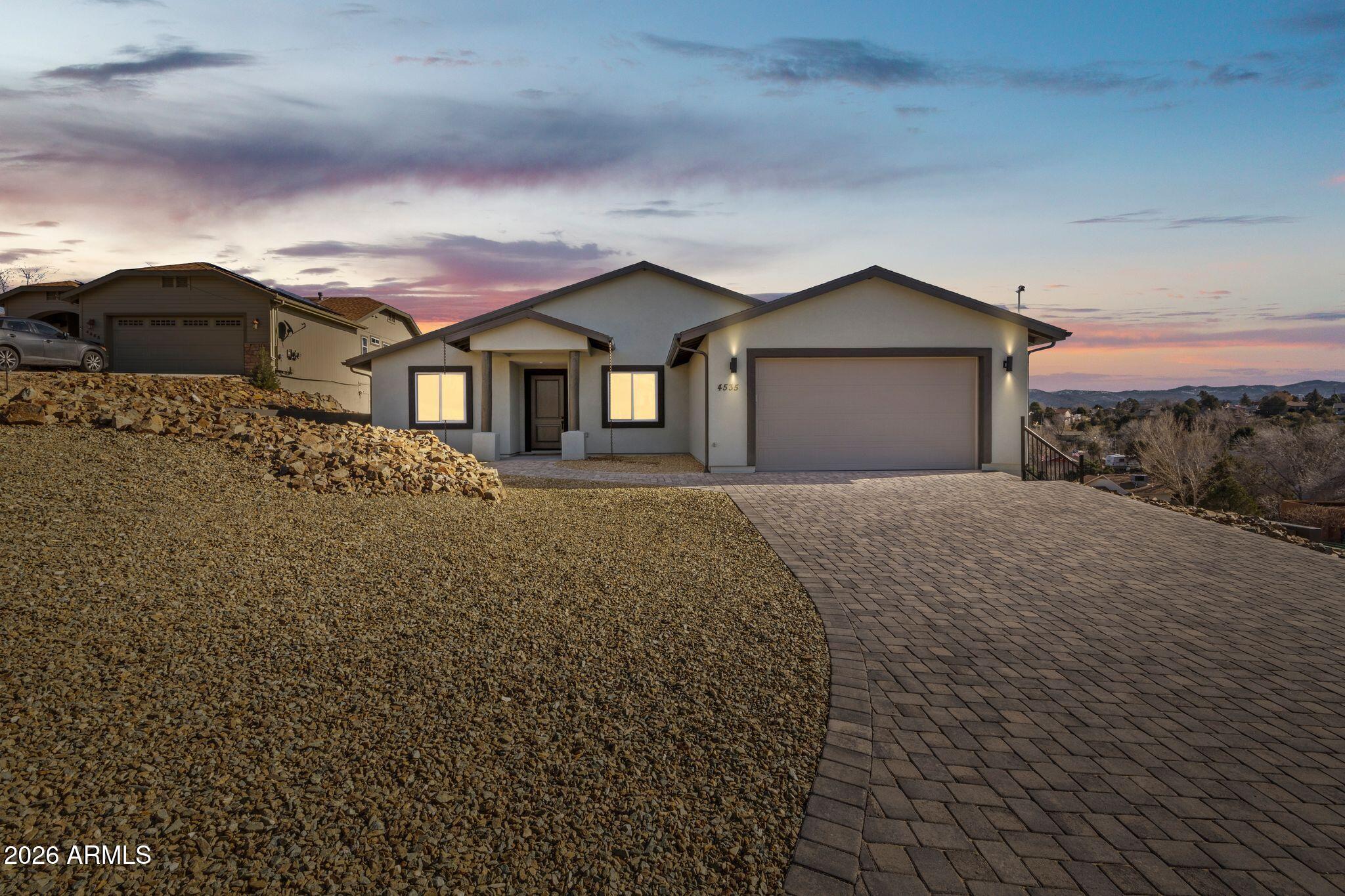 4535 Victor Drive Prescott, AZ 86301 - Photo 1 of 43 a front view of a house with a yard