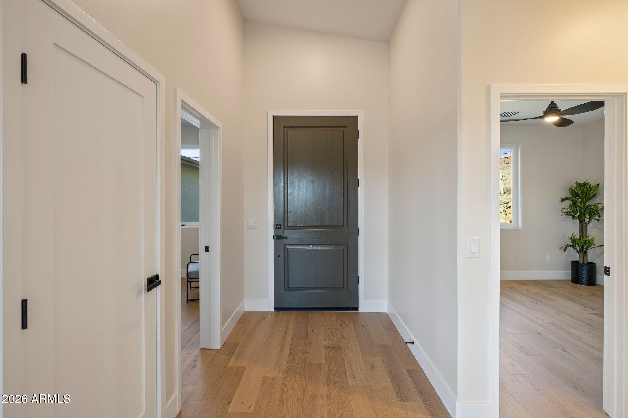 4535 Victor Drive Prescott, AZ 86301 - Photo 27 of 43 a view of a hallway with wooden floor and a bathroom