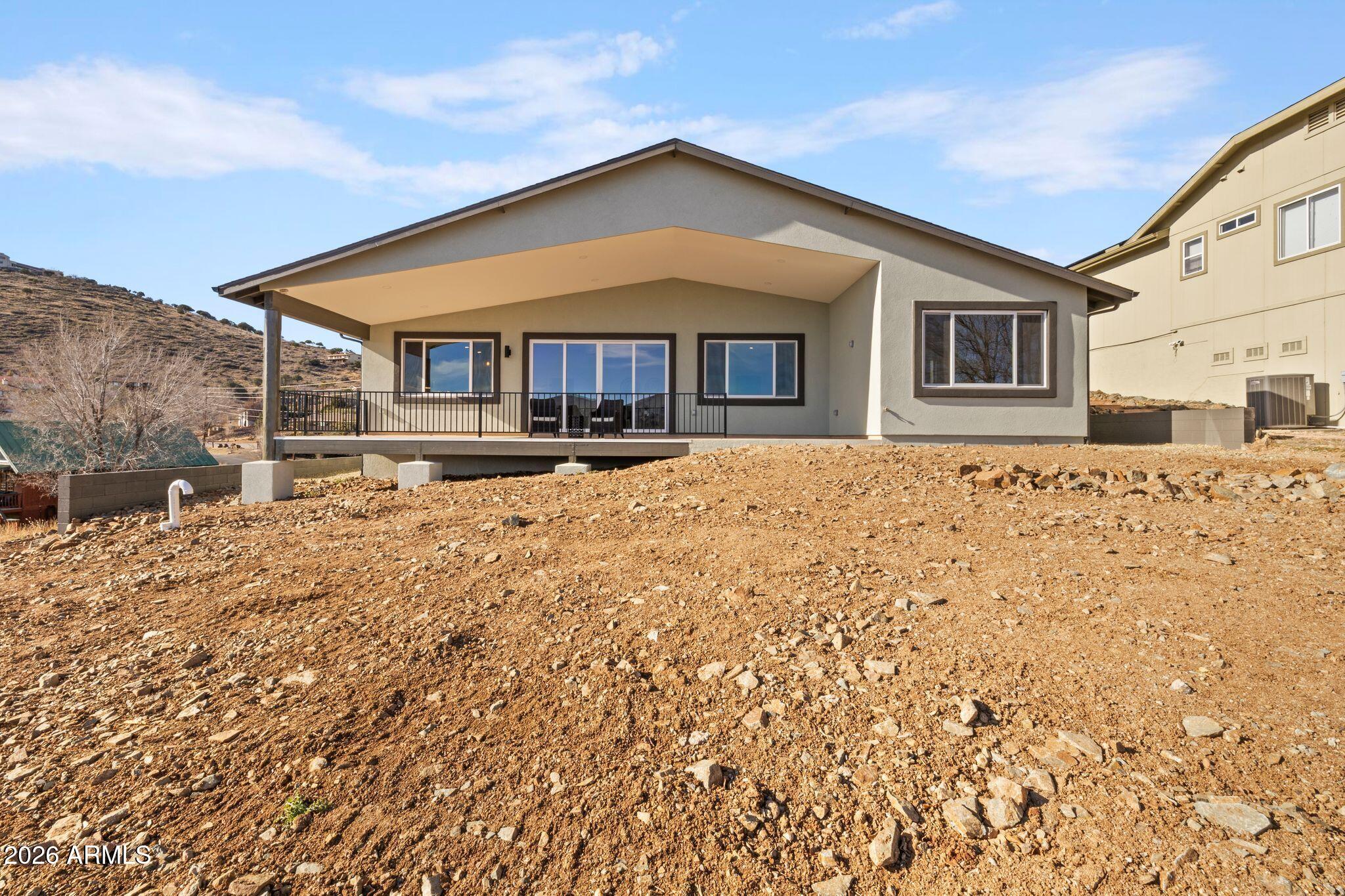 4535 Victor Drive Prescott, AZ 86301 - Photo 35 of 43 a front view of a house with a yard