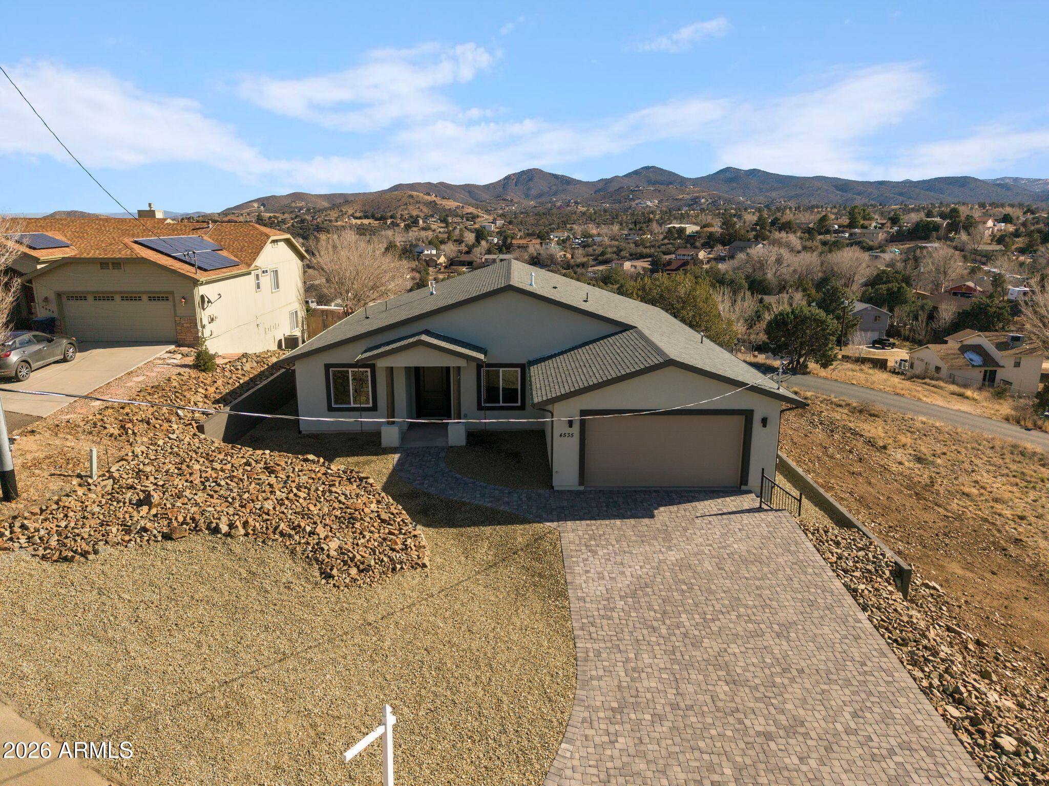 4535 Victor Drive Prescott, AZ 86301 - Photo 42 of 43 a view of a house with a mountain