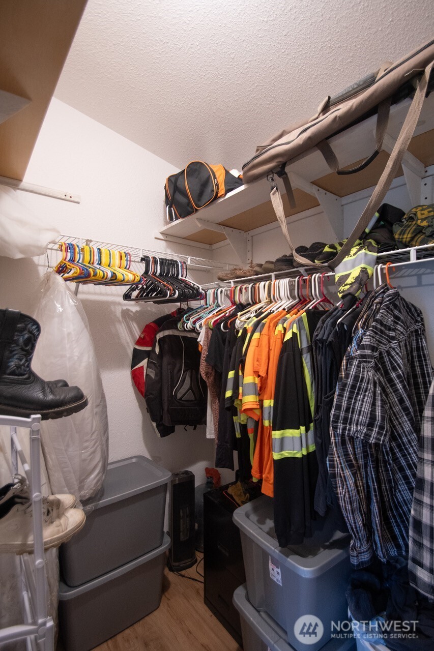 307 South 3rd Street Pe Ell, WA 98572 - Photo 12 of 29 a view of walk in closet with clothes and shoes
