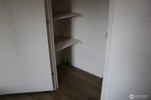 a view of staircase with wooden floor