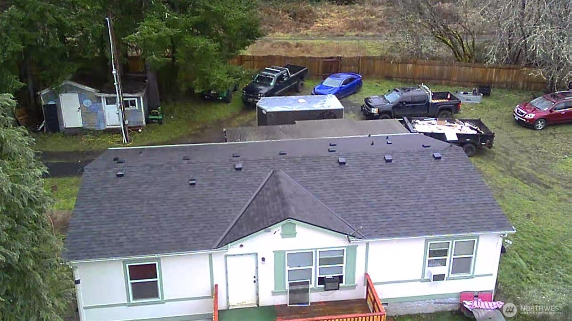 307 South 3rd Street Pe Ell, WA 98572 - Photo 23 of 29 an aerial view of a house roof deck with couches and potted plants