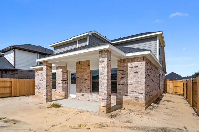 a front view of a house with a pathway