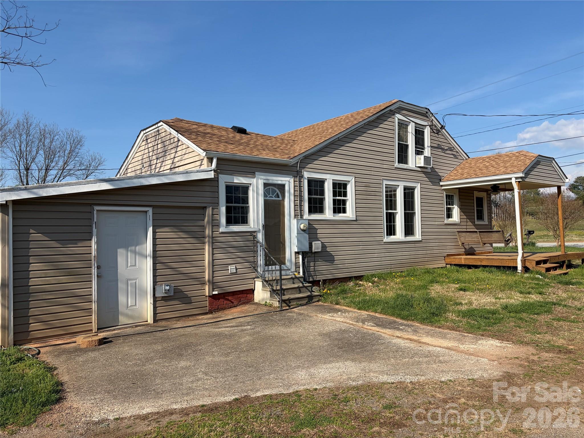 405 Jug Wilson Street Morganton, NC 28655 - Photo 18 of 21 a front view of a house with garden