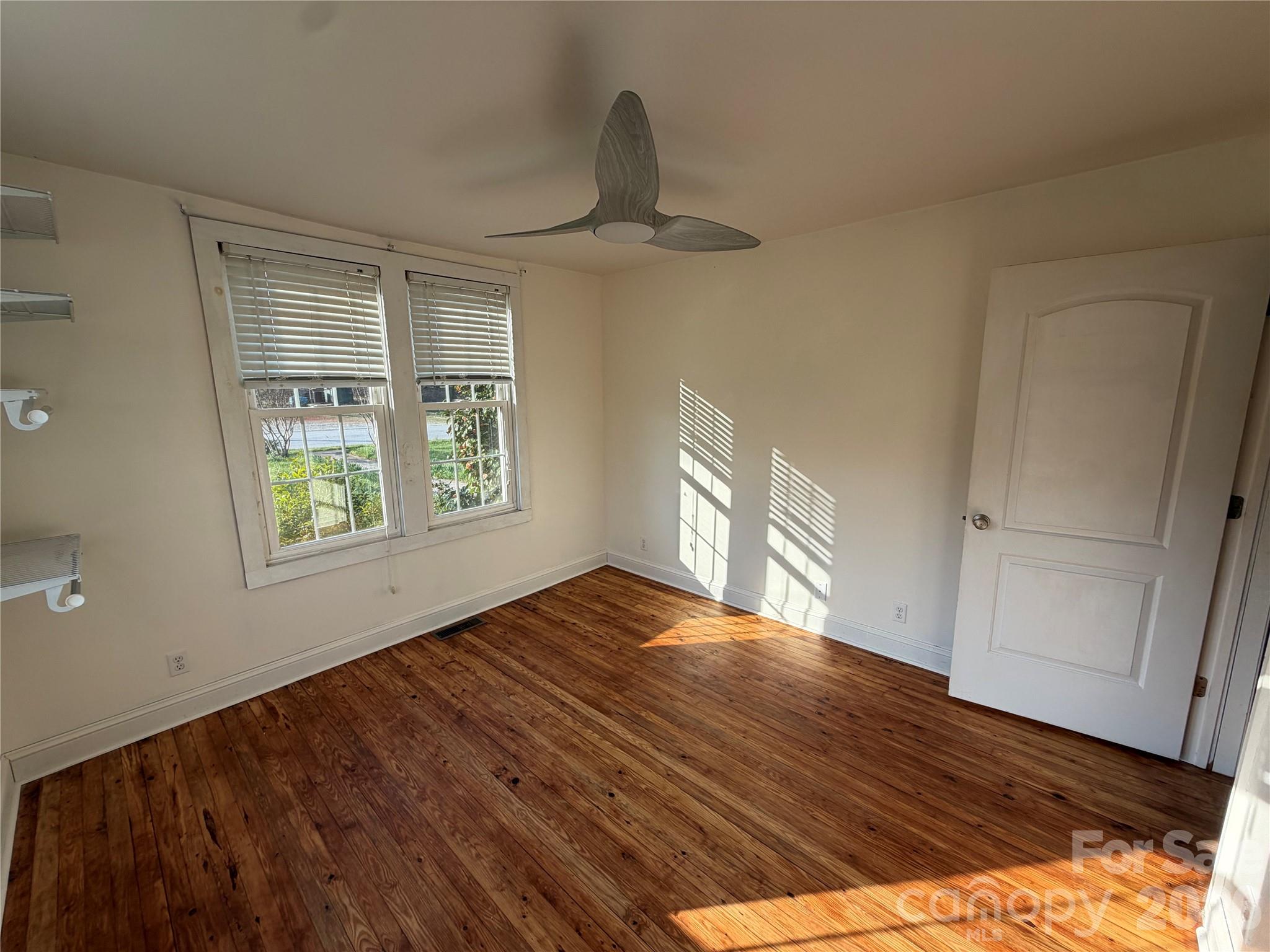 405 Jug Wilson Street Morganton, NC 28655 - Photo 10 of 21 a view of an empty room and window