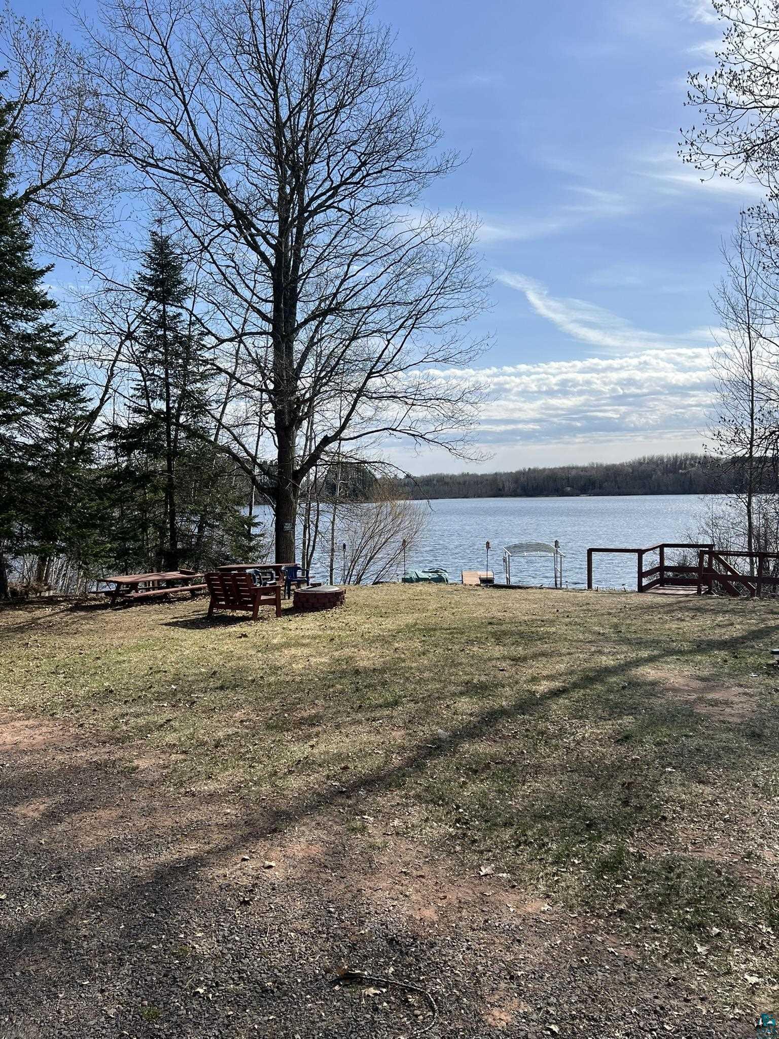 8467 County Rd P Lake Nebagamon, WI 54849 - Photo 4 of 25 Expansive grassy area with direct lake frontage