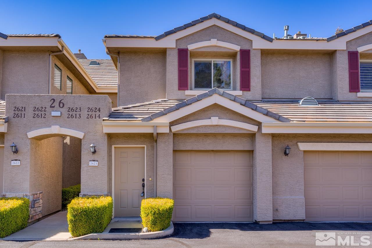 900 S Meadows, Unit 2623 Reno, NV 89521 - Photo 1 of 28 a front view of a house with yard