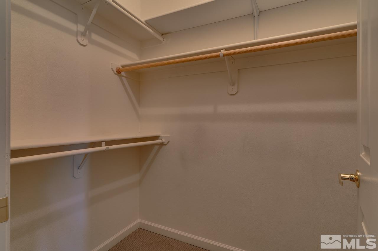 900 S Meadows, Unit 2623 Reno, NV 89521 - Photo 19 of 28 a view of a room with racks on the wall