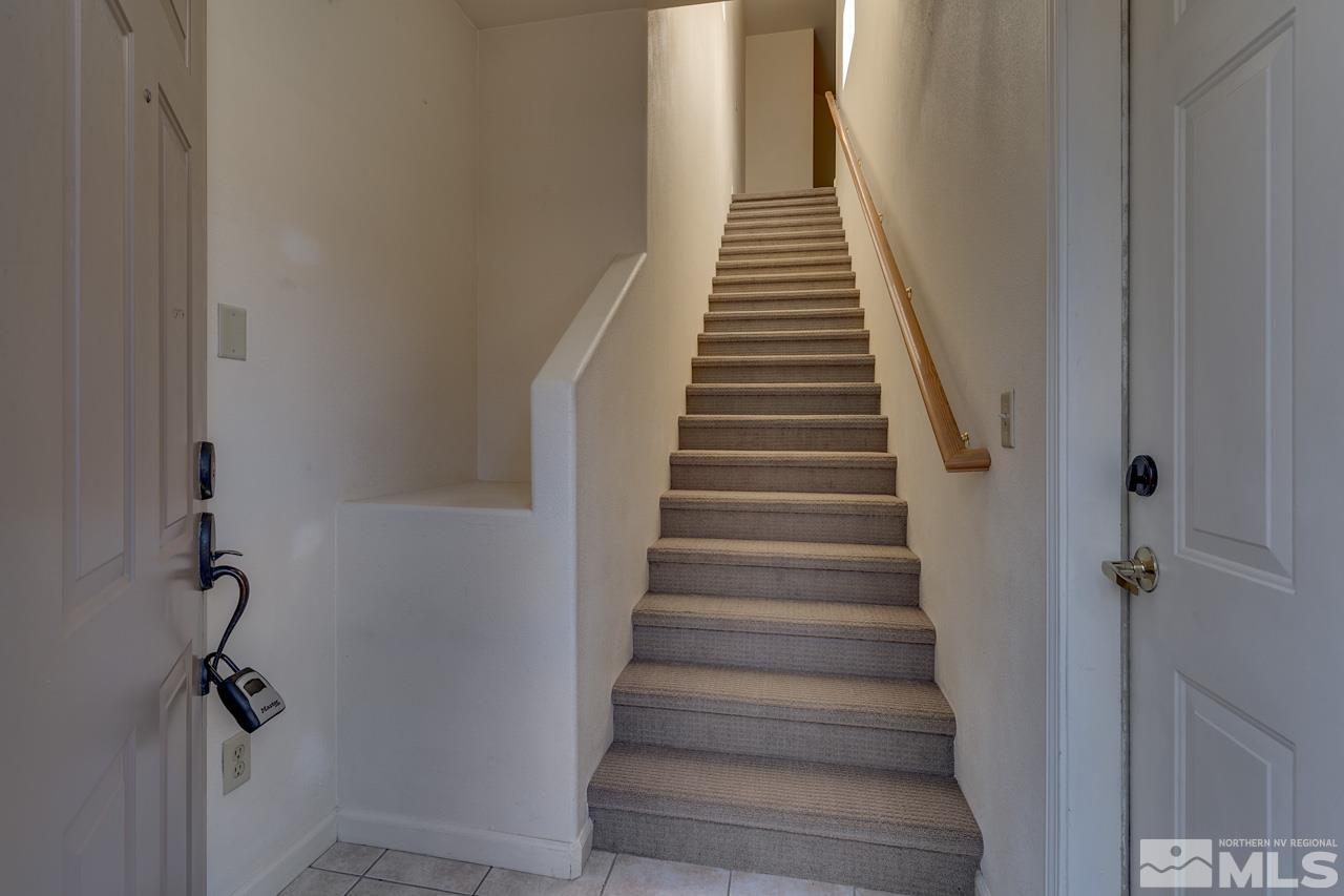 900 S Meadows, Unit 2623 Reno, NV 89521 - Photo 2 of 28 a view of staircase with white walls