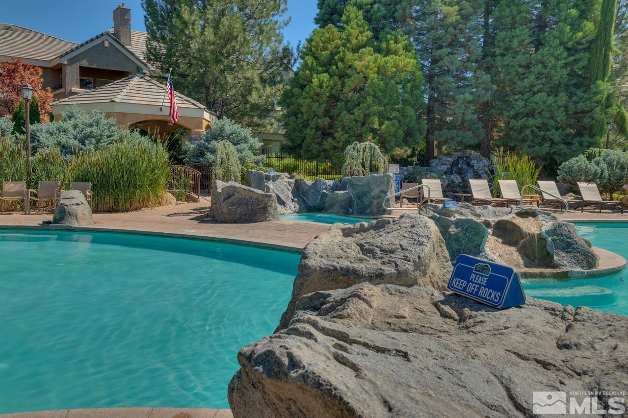 900 S Meadows, Unit 2623 Reno, NV 89521 - Photo 28 of 28 a view of a backyard with plants and a patio