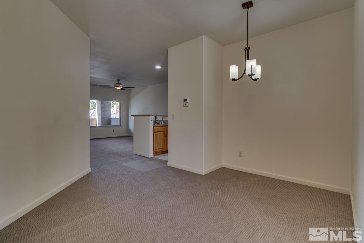 900 S Meadows, Unit 2623 Reno, NV 89521 - Photo 3 of 28 a view of a kitchen with a sink and cabinet area